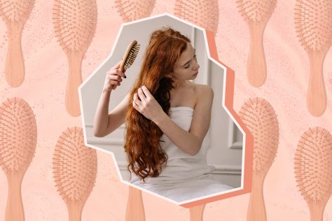 woman brushing hair on top of brush pattern